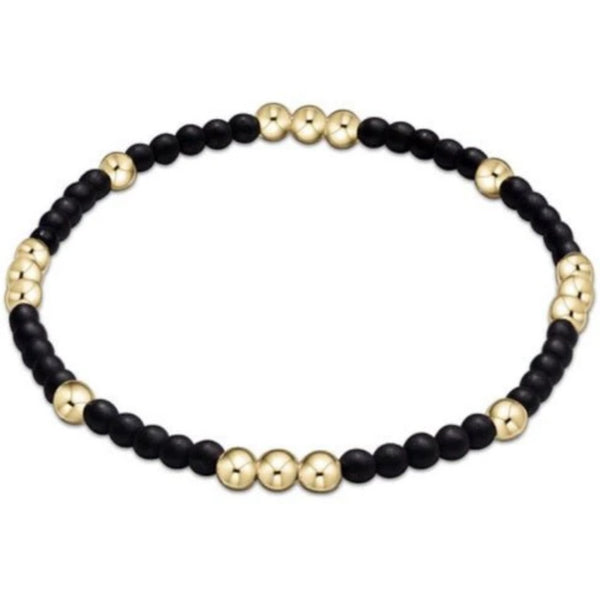 Black Beaded Bracelet with random Gold Beads