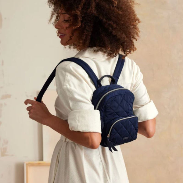 Lady Wearing Navy Mini  Backpack
