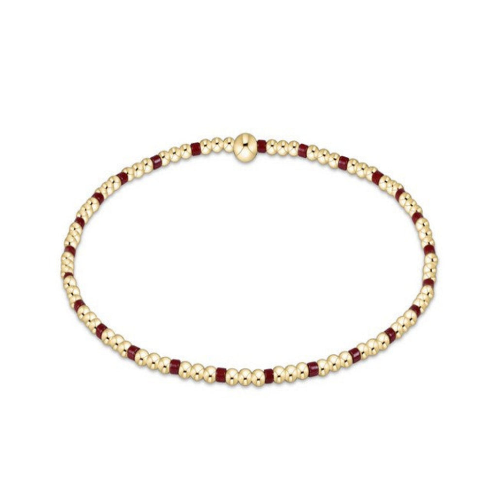 Gold and Wine Beaded Bracelet on white Background
