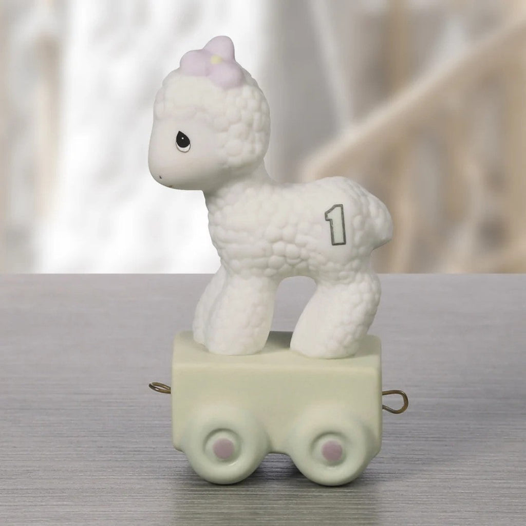 White lamb riding on a wagon for Birthday Train Series Age 1