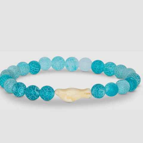 Aqua blue beaded bracelet with beige seal