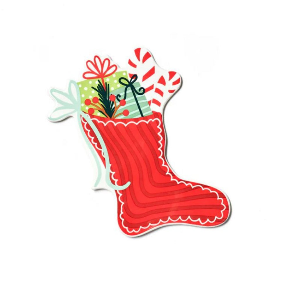 Red Stocking Stuffed with Candy Canes and Package