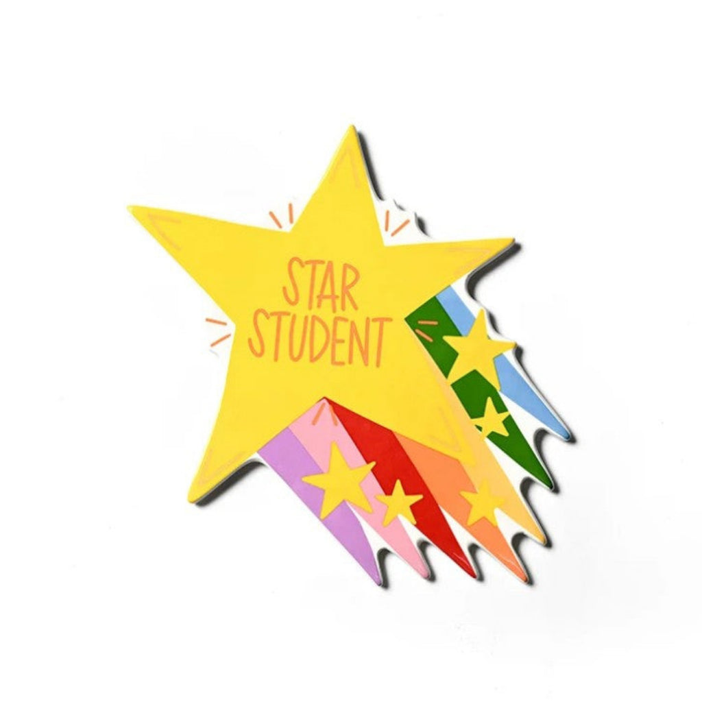 A colorful enamel pin shaped like a shooting star, featuring a large yellow star with the words 'STAR STUDENT' in orange, and a tail of multicolored stripes with smaller yellow stars, shown on a plain white background.