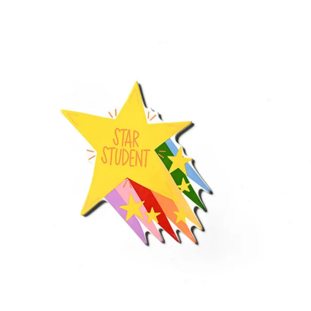 A star-shaped enamel pin with the words 'STAR STUDENT' in orange, featuring a bright yellow main star and colorful shooting-stars tails in green, blue, red, orange, and purple on a white background.