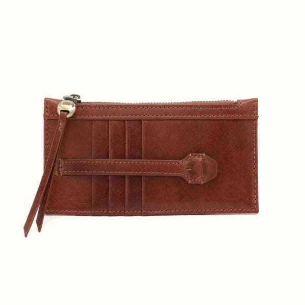 A brown leather zip-around card holder wallet with multiple card slots, a front slip pocket, and a wristlet strap with a gold-tone metal clasp, shown on a plain white background.