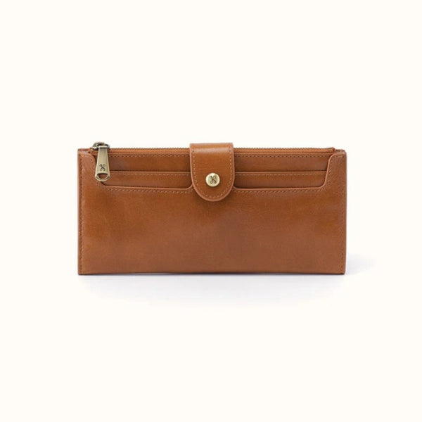 A tan leather zip-around wallet with a front flap closure and a gold snap button, shown on a plain white background.