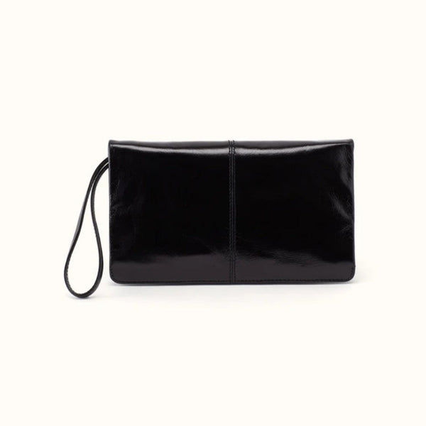 A black patent leather clutch bag with a wristlet strap, shown against a plain off-white background.