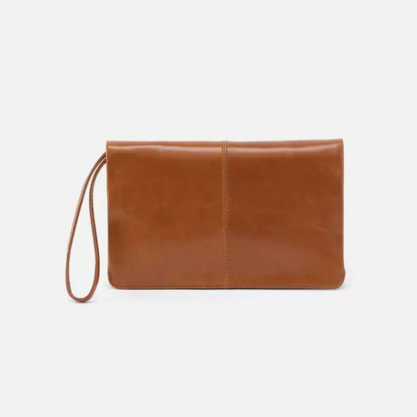 A tan leather clutch bag with a wrist strap, shown against a plain white background.