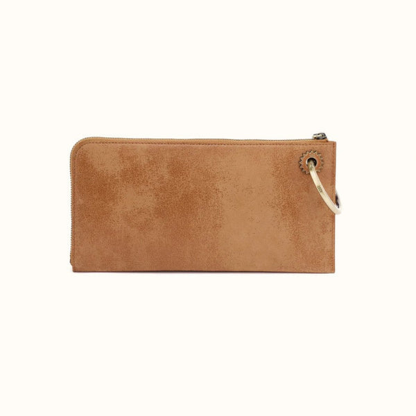 A tan suede zippered pouch with a small silver metal ring and strap attachment on the right side, shown against a plain white background.