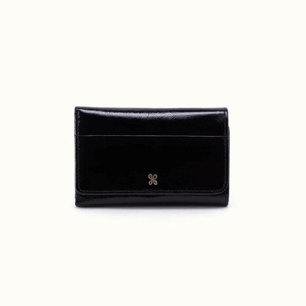 A black patent leather bi-fold wallet with a small gold double-X logo on the front, photographed against a plain off-white background.