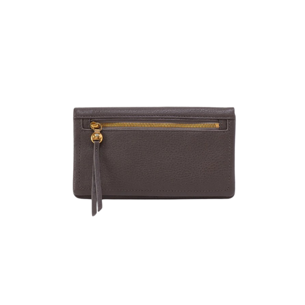 A dark brown textured leather zip-around wallet with a gold-tone zipper and a matching leather tassel charm, shown against a plain white background.