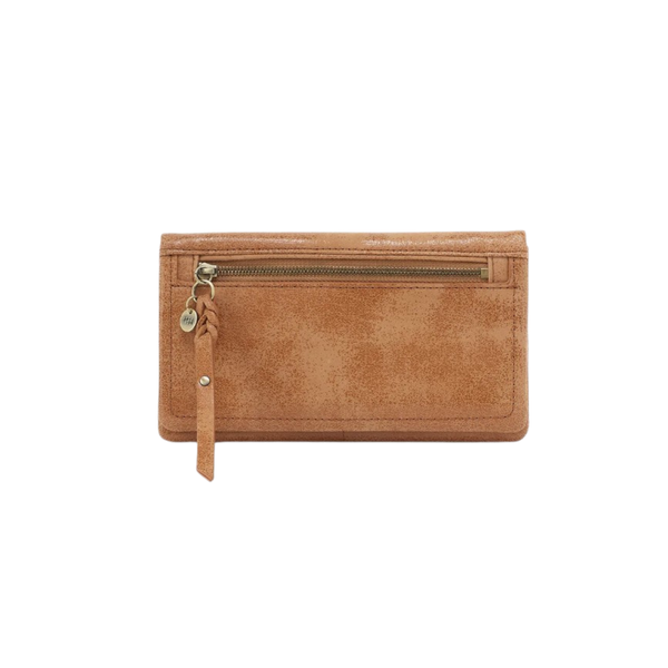 A tan faux-leather zip-around wallet with a braided leather zipper pull and a horizontal card slot, shown on a plain white background.