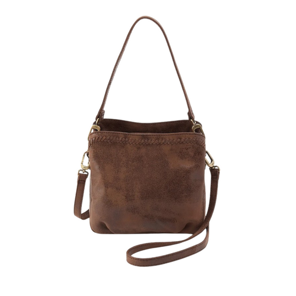 A brown faux-leather crossbody bag with a single shoulder strap and a detachable wristlet strap, shown against a plain white background.