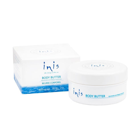 White and blue box with white jar of body butter