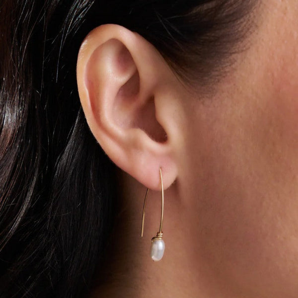Lady wearing Simplicity Earrings