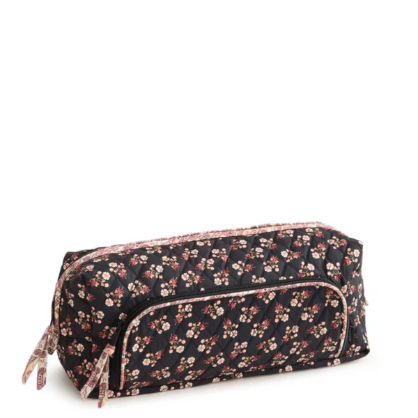 A rectangular quilted cosmetic pouch with a black background and a delicate pink, red, and white floral print, featuring a matching zippered front pocket and ribbon ties.