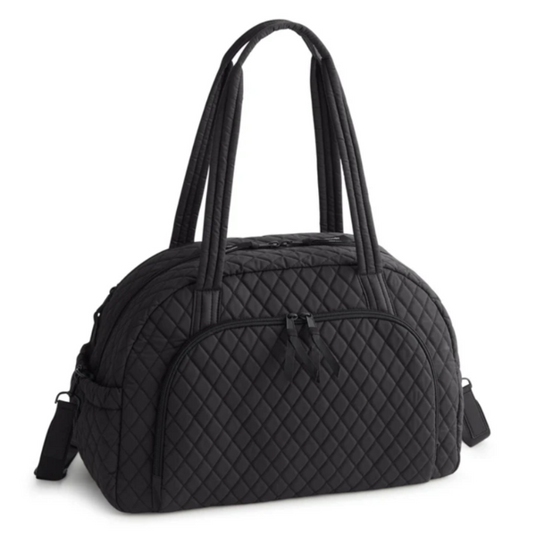 A black quilted duffel bag with dual top handles and a detachable shoulder strap, shown on a plain white background.