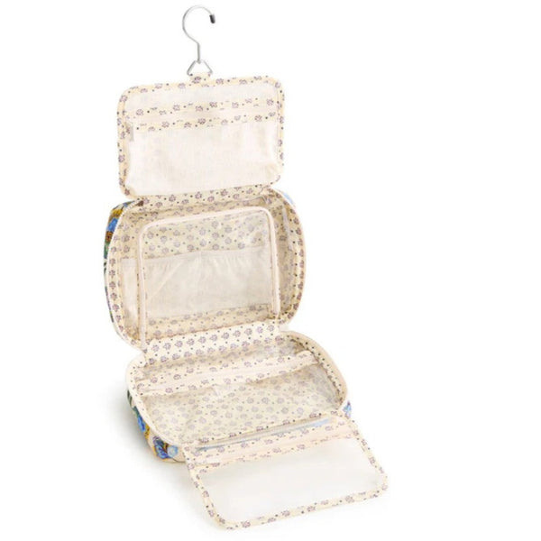 Inside view of Hanging Travel Organizer with Cream Background and blue and green flowers