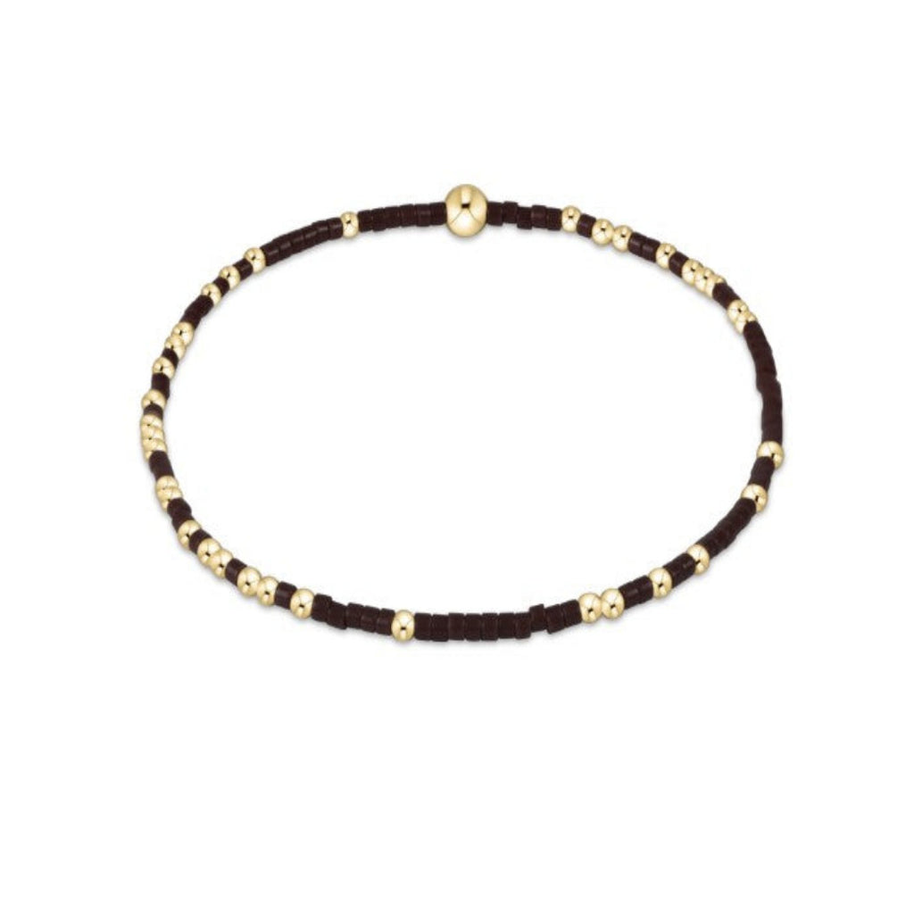 Brown Beaded Bracelet with gold beads on a white background