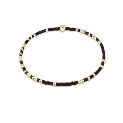 Brown Beaded Bracelet with gold beads on a white background