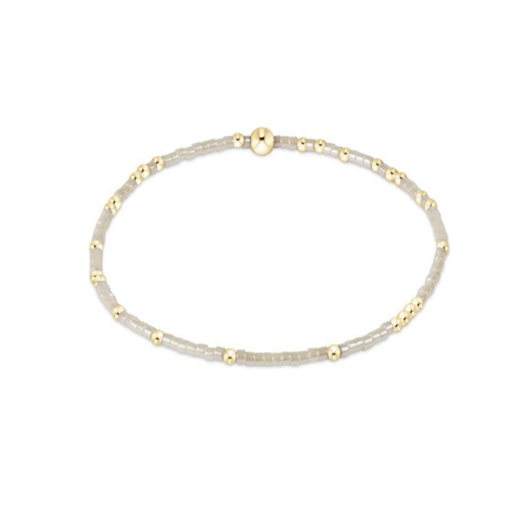 Off White Beaded Bracelet with Gold Accent Beads