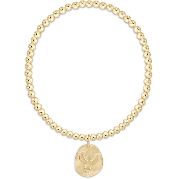 Gold beaded bracelet with an eagle engraved on a gold disc